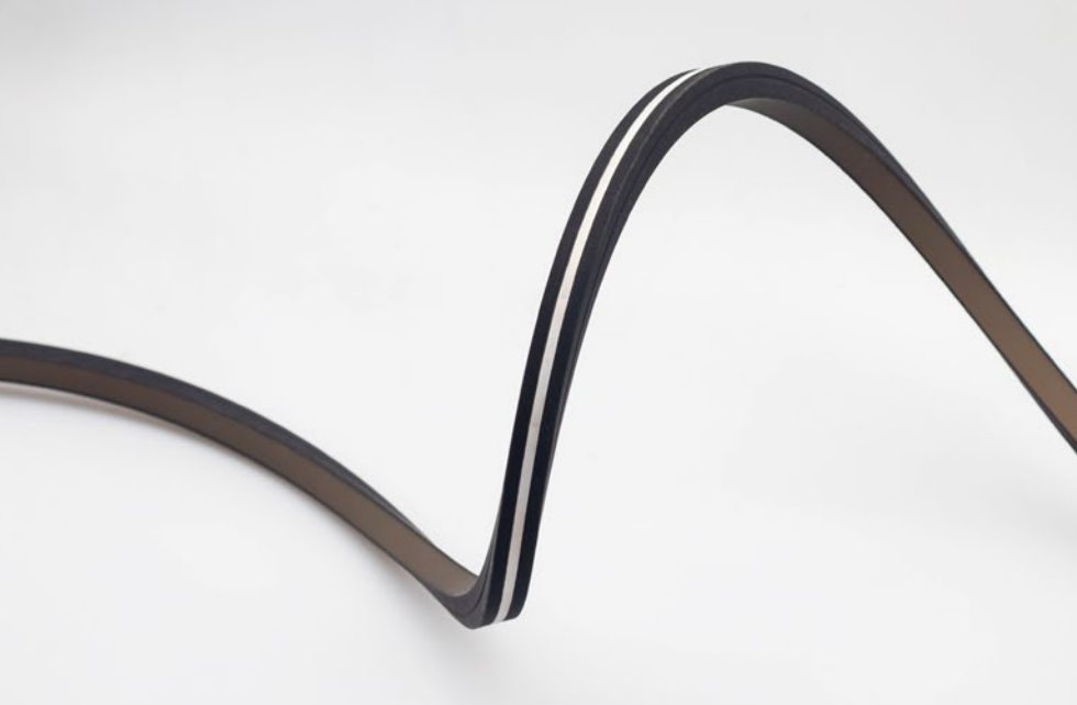 Black LED neon flex with a dark silicone housing for modern lighting designs